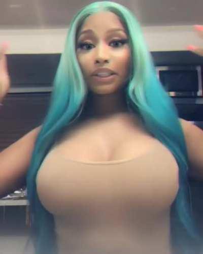 Nicki Minaj Rubs Her Massive Boobs