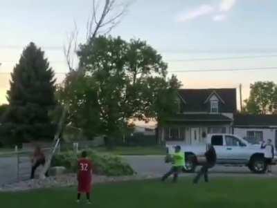 Trying to uproot a tree by pulling it towards you.