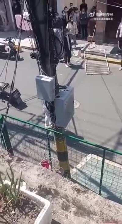 Quarantine enforcement workers beating civilians in Shanghai