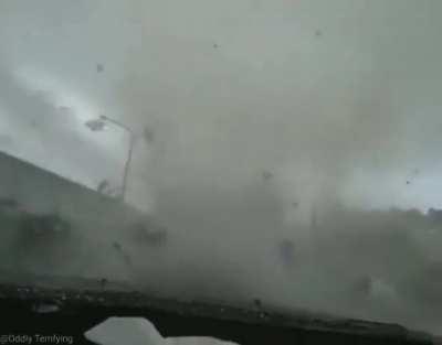 Tornado forms on car
