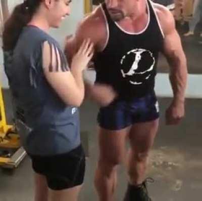Bodybuilder lets a blind girl feel his muscles and it puts the biggest smile on her face