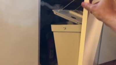 Ikea waste buckets, attached to door with pulley system for the lids 😁