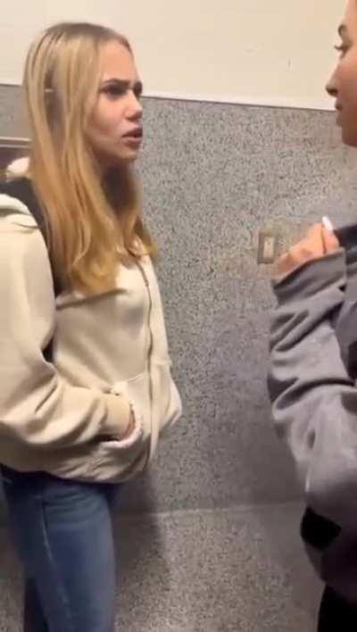 Student completely knocks out another student because her bf cheated on her