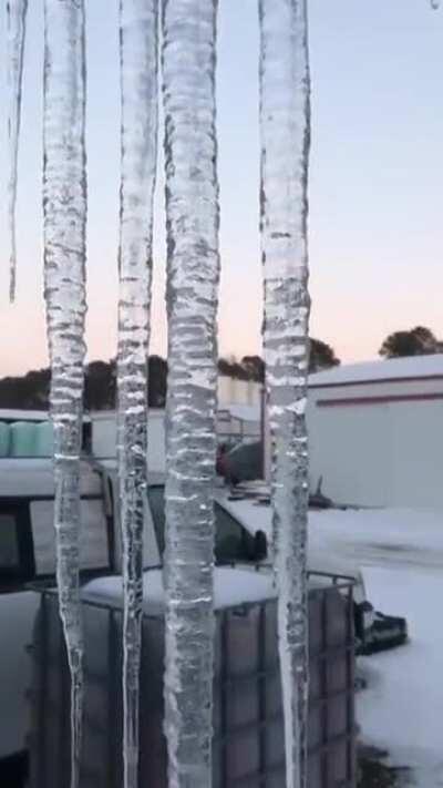 Emkay symbol in ice.