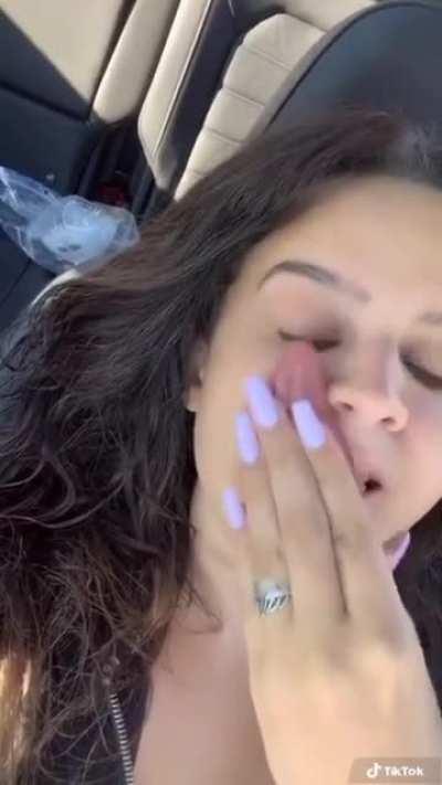 Tongue so long she can lick her own eyeball