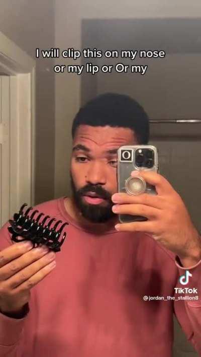 I personally go for clamping my lips together first