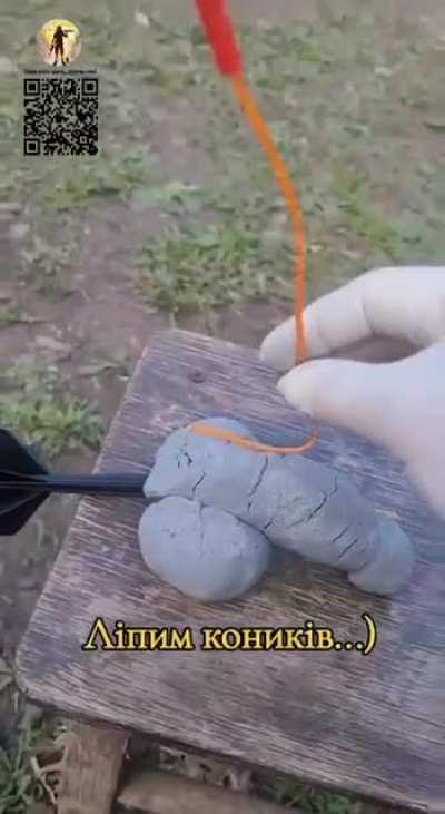 UA POV: Ukrainian soldiers grinding up plastic explosives to make munitions for drones