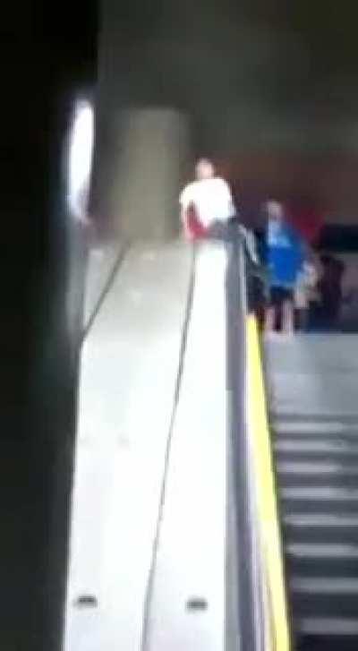 Sliding down an escalator