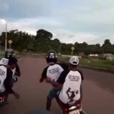 Holding hands while riding