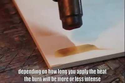 Lady demonstrates how to perform controllable wood burning using ammonium chloride