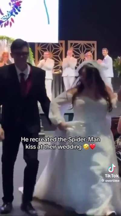 Dude recreated the Spiderman kiss at his wedding