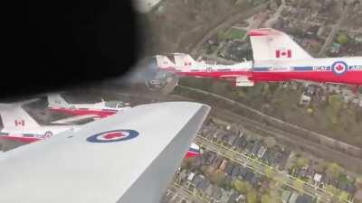 Another angle of the Snowbirds in action over Toronto.