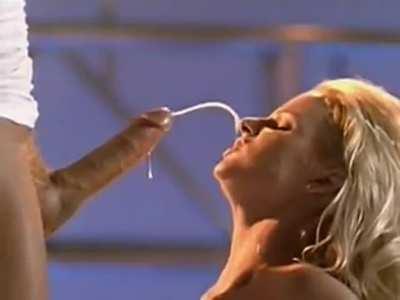 One of the greatest cumshots ever: Nikki Tyler makes Peter North cum with a hands-free blowjob, and he covers her with a massive load (1998)