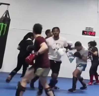 Head kick KO during a sparring session.