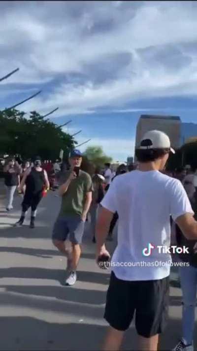 Kid wearing ‘Trump’ shirt harassed by protesters.
