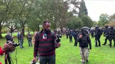 Antifa pepper spray woman(alleged fascist) as they counter protest 'Defend SPD' rally including short interview with some comrades - Seattle 10th October