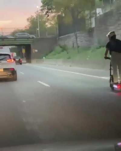 Scooter on the highway