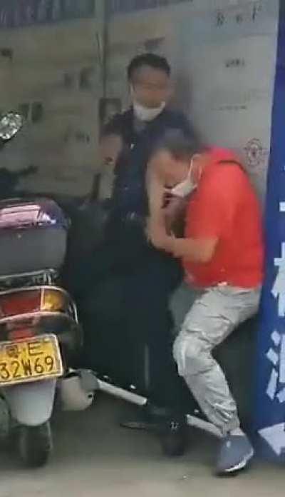 Middle aged Chinese fighting