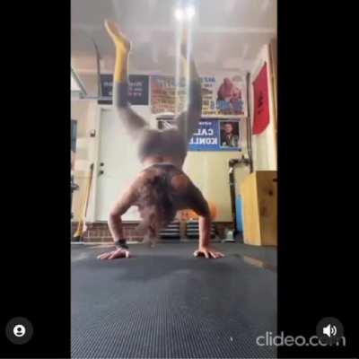 Kris doing handstands