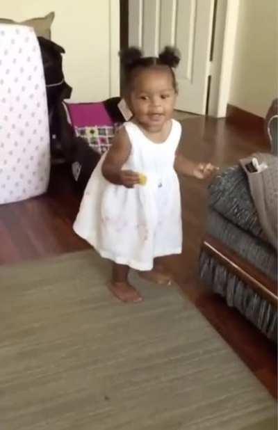 Guy reacts to his daughter taking her first steps