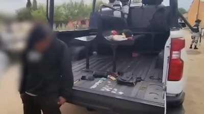 Sicario crying while being detained