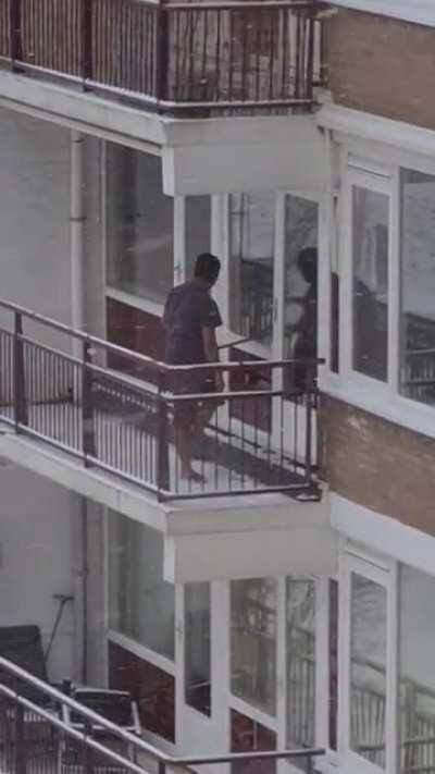 Man got stuck on his balcony in shorts and a t-shirt during a blizzard.
