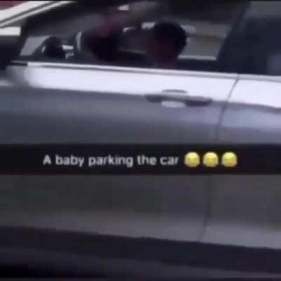 A baby parking the car 😂😂😂