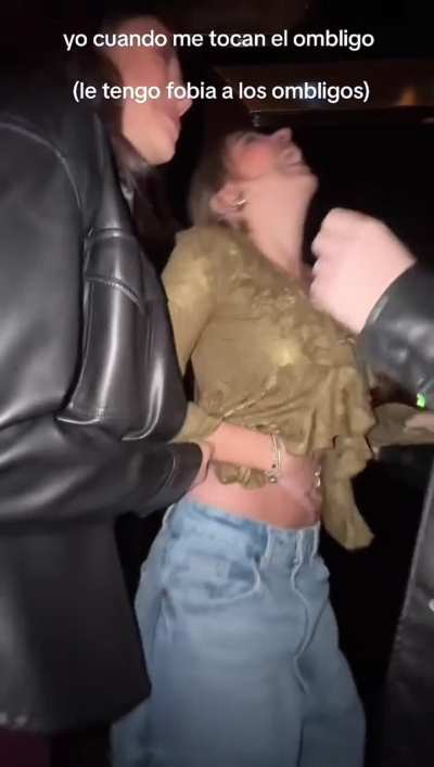 Quite a revealing outfit for such a wildly ticklish bellybutton