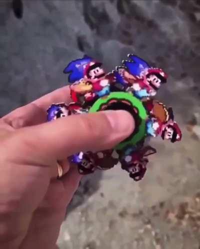 Artist designs fidget spinners that create animations.