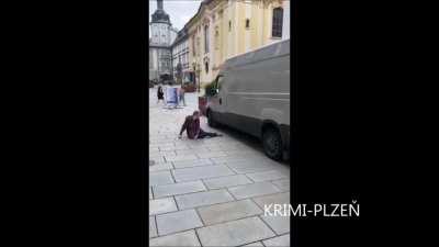 Guy fights van so hard he collapses on ground and gets arrested