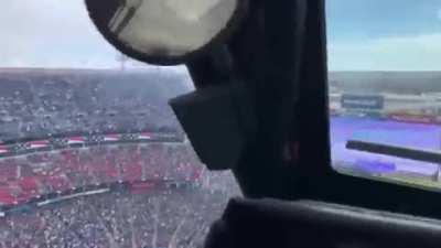Low level (possible illegal) military flyover over a stadium