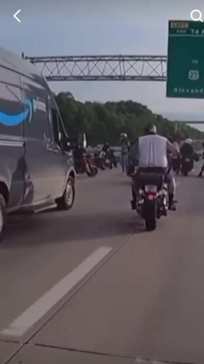 Amazon driver breaks through motorcyclist blockade