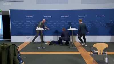 Denmark health official collapsed during the press conference announcing the AstraZeneca discontinuation.