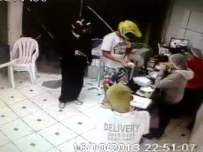 Robbers gun down by cop hiding in the shadows