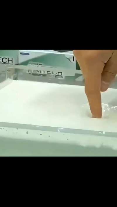 Non-Newtonian Fluid That Hardens Under Pressure But Softens When Stress Is Removed