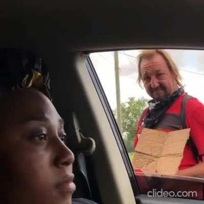 POS tries to shame a homeless man for not having black lives matter written on his sign.