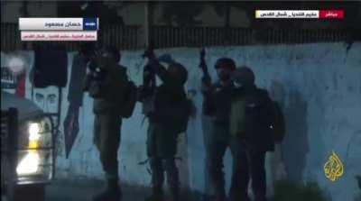 Watch Israeli forces kidnap a Palestinian, make them put on IOF uniform, tie them up and blindfold them, and use them as a human shield during a raid at Qalandia refugee camp in occupied Jerusalem.