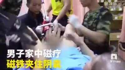 Chinese man rescued after his testicles crushed by powerful magnets while performing 