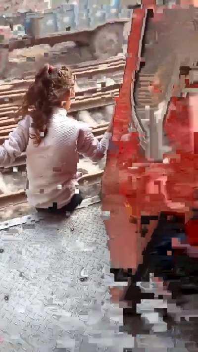 The girl literally jumps out of the running train risking her life