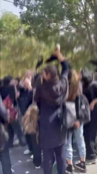 Young Iranian students protest against hijab and dictator ship and chant 