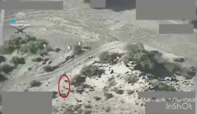 A Houthi sniper flees after his position is discovered. He was targeted by the Saudi Air Force in Yemen.