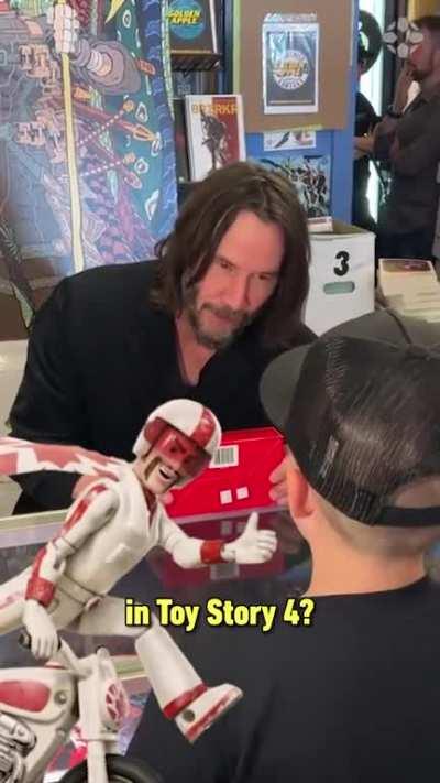 Keanu Reeves meets a young fan