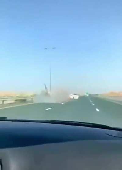Tesla hitting a camel in the middle of the street, in Dubai.