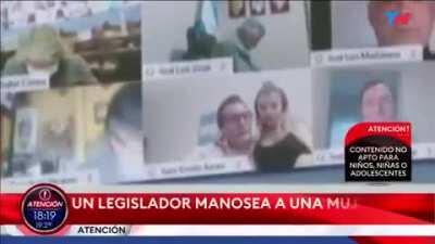 Diputado se pone cariñoso en la sesion.....