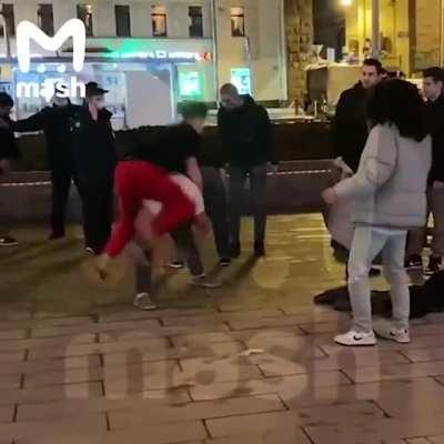 To kick the dude in grey pants.