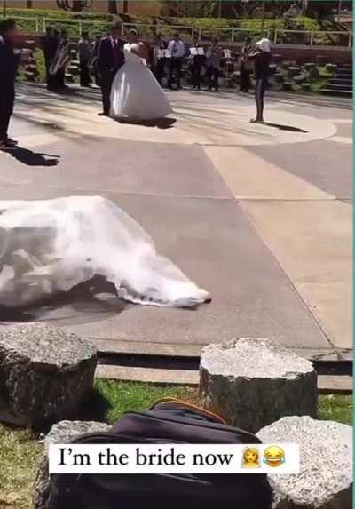 DOG IS THE BRIDE NOW