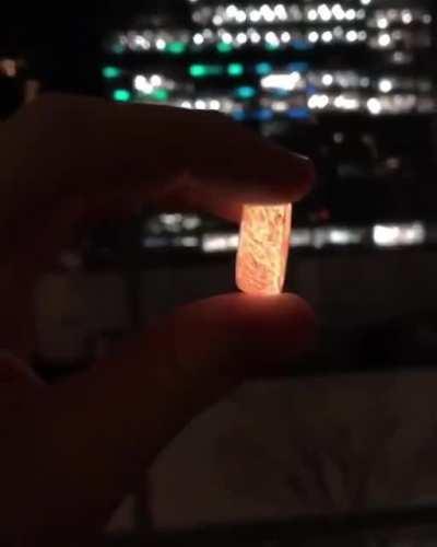 Ring made of resin epoxy mixed with strontium aluminate powder.