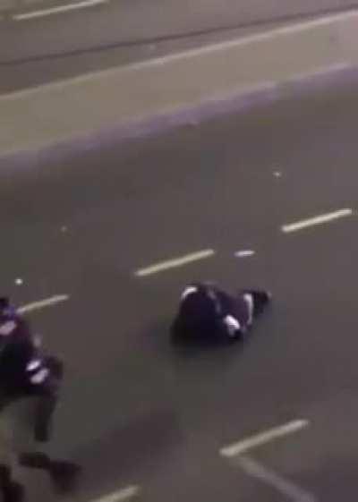 Police ganging on protestor, Serbia