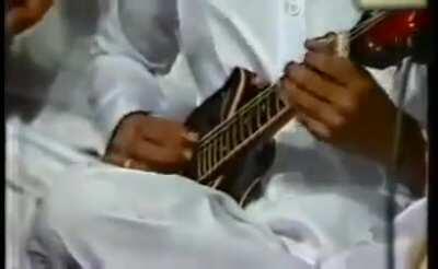 Young Uppalapu Srinivas (~age 11) playing Tyararaja Keertana Entha Muddo in Mandolin. He was child prodigy and his genius was compared with the likes of Beethoven,Mozzart Picasso,Newton