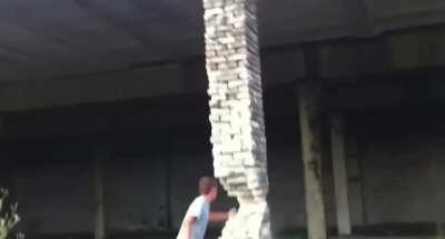 oddly terrifying and oddly stupid, old building collapsing almost caught the kid